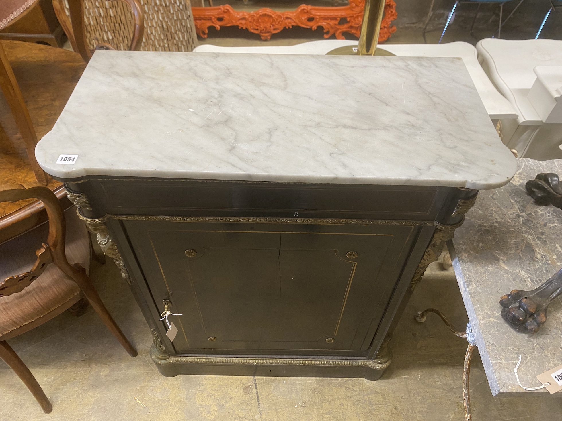 A 19th century French gilt metal mounted brass inlaid marble topped ebonised pier cabinet, width 83cm, depth 38cm, height 101cm